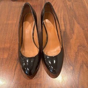 Used great condition Coach' Black Patent Leather Wedge Pump, Size 8.5